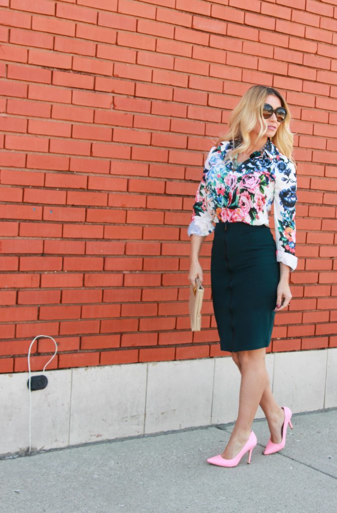Floral blouse and pink pumps.