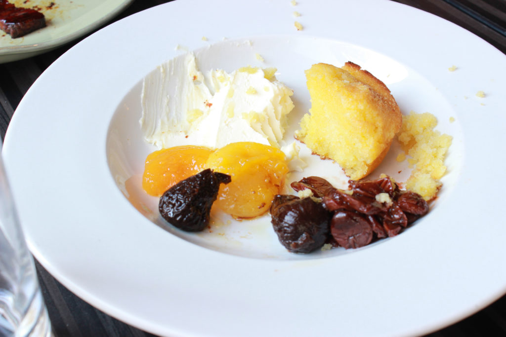 Brunch in Indy: Pioneer. Olive oil and polenta cake with stewed fruit.